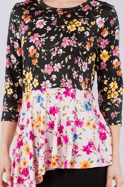 Celeste Full Size Floral Asymmetrical Hemline Round Neck Top Plus Size - Lositime
